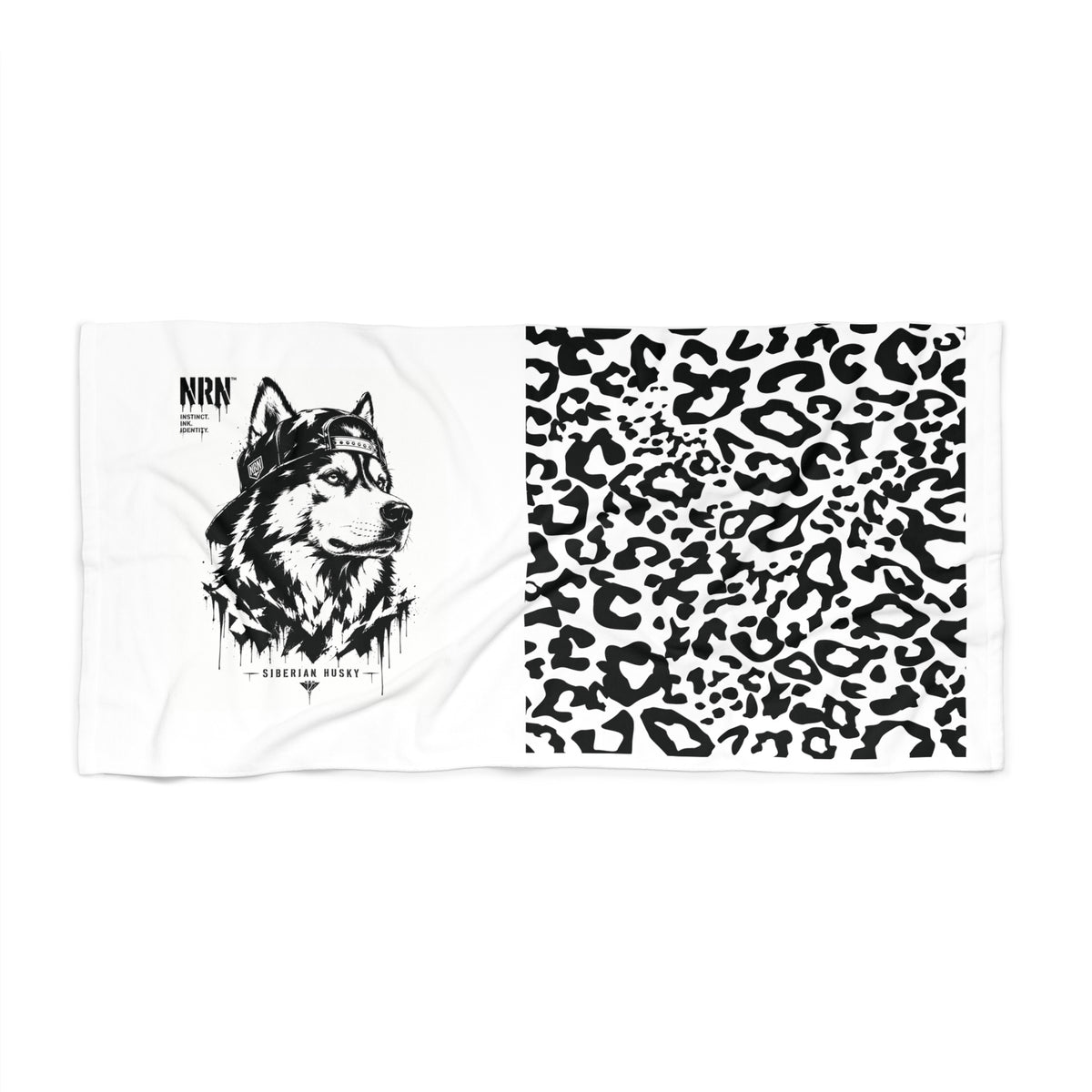 Monochrome wildlife beach towel with wolf and leopard artwork